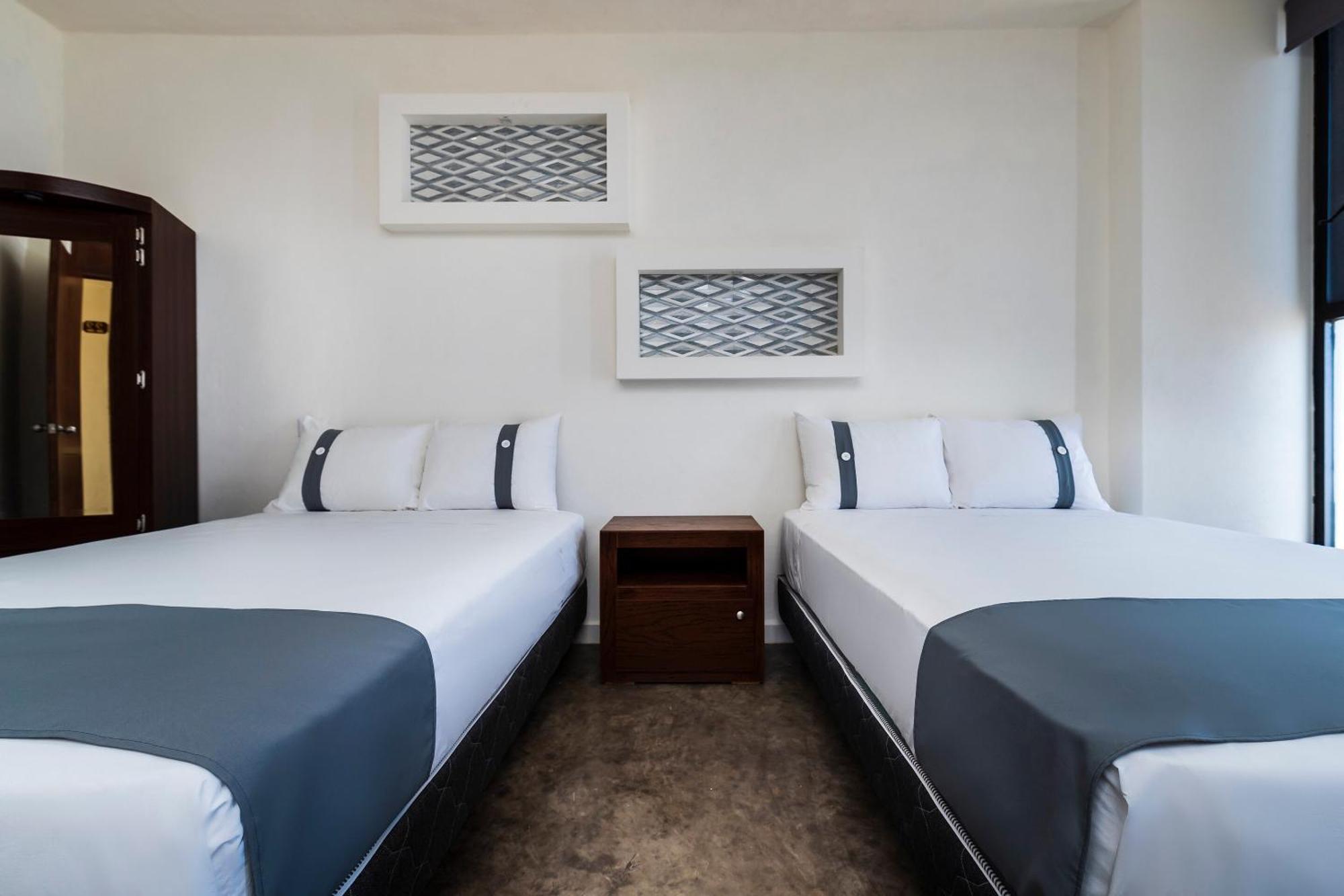 Capital O Hotel Joyma Suites, San Luis San Luis Potosi Ngoại thất bức ảnh