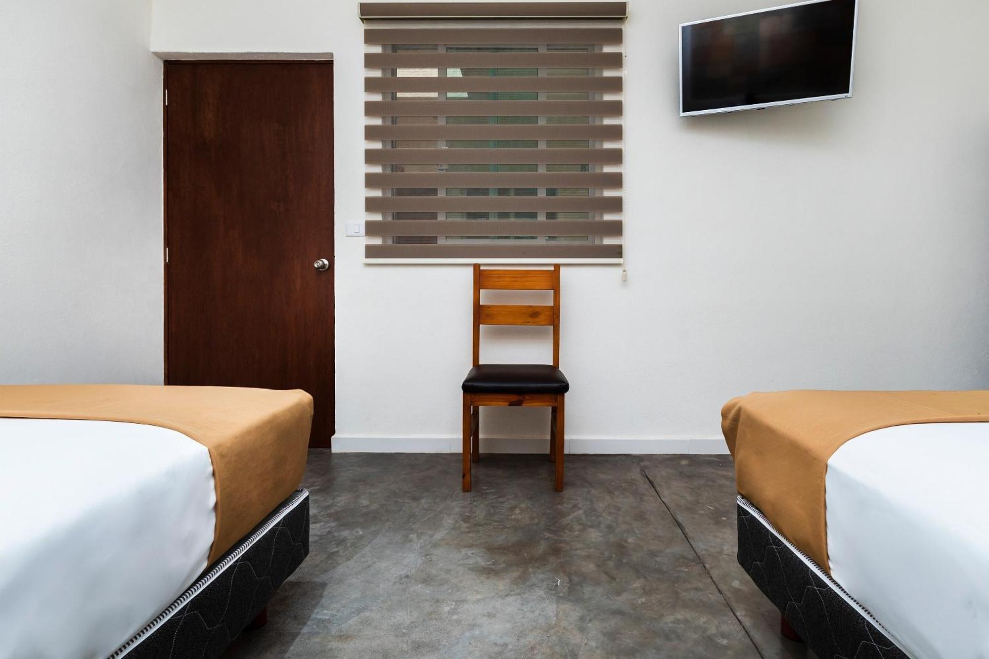 Capital O Hotel Joyma Suites, San Luis San Luis Potosi Ngoại thất bức ảnh